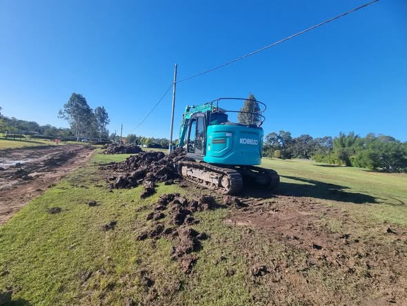 MJF excavator carrying out earthworks on a rural property